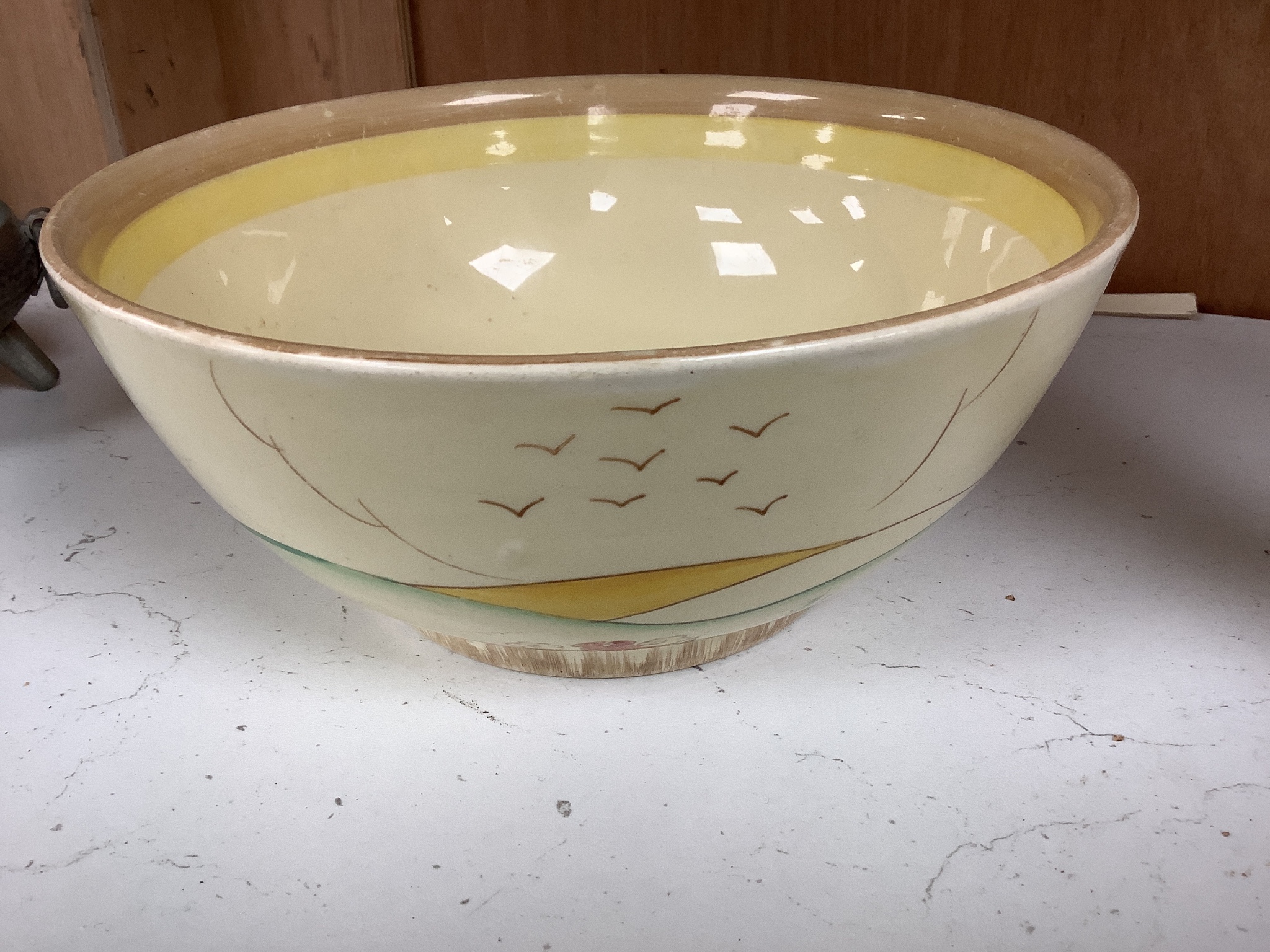 A Clarice Cliff landscape bowl, height 8cm diameter 18cm